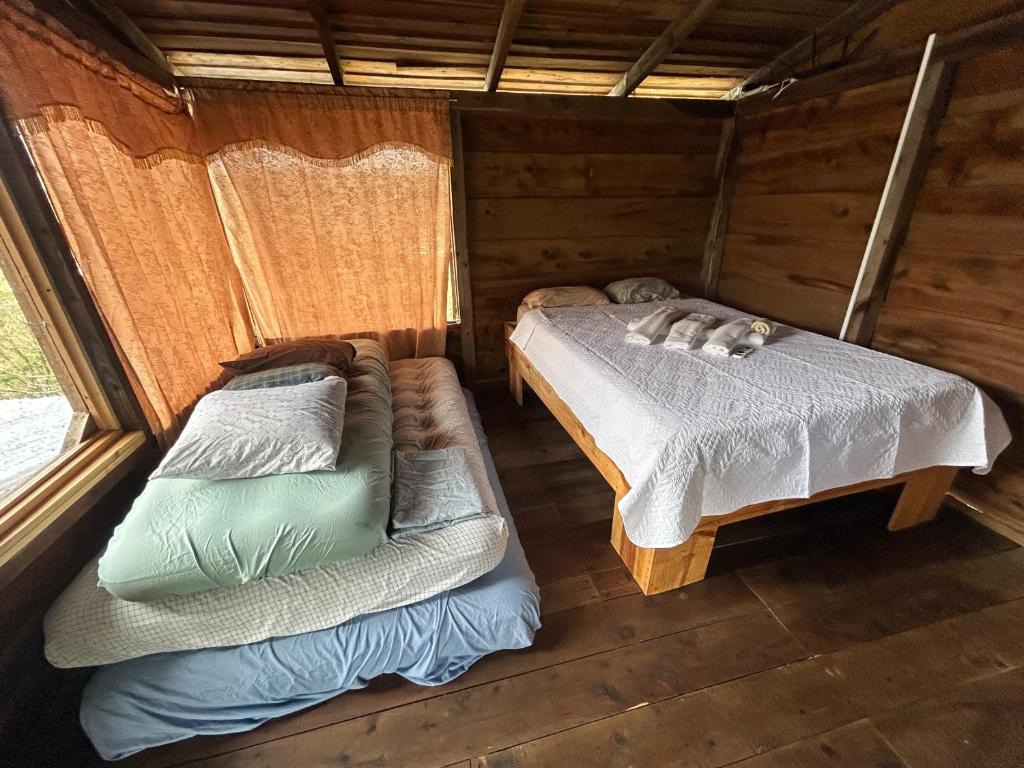 Postel nebo postele na pokoji v ubytování Cabañas la esperancita