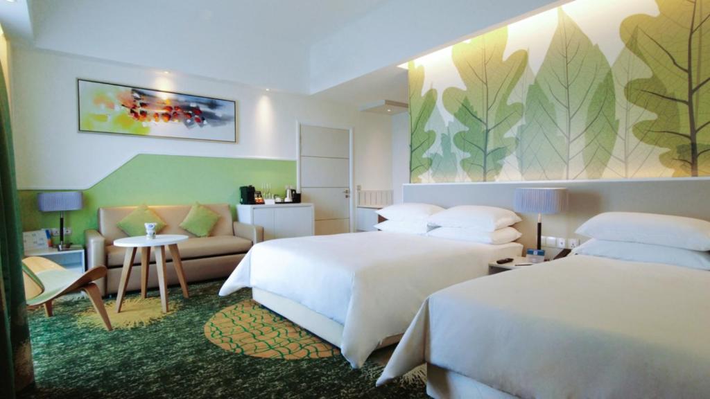 Postel nebo postele na pokoji v ubytování Sunway Velocity Hotel Kuala Lumpur