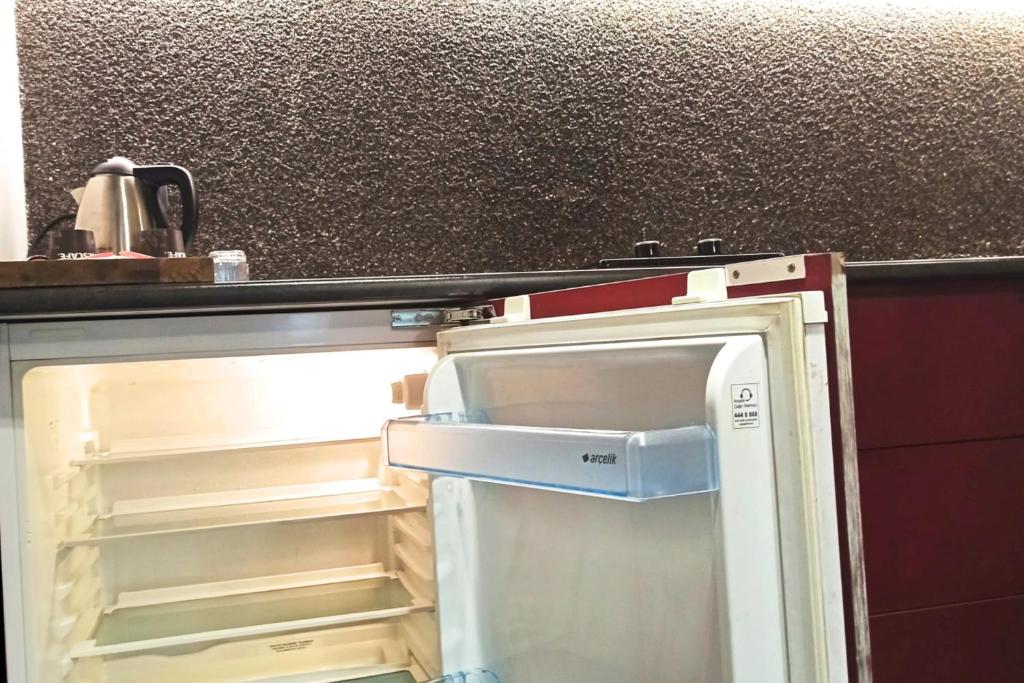 A kitchen or kitchenette at BC Residence Pangaldi