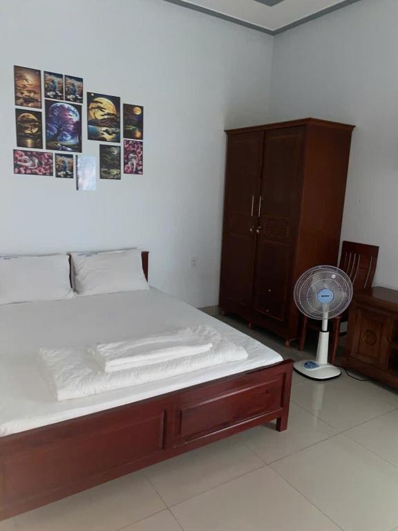 Postel nebo postele na pokoji v ubytování Motel Long Thành Quang