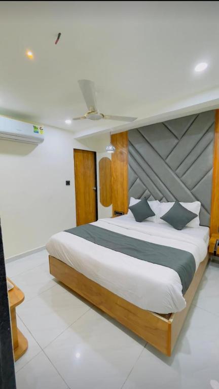 Postel nebo postele na pokoji v ubytování Hotel Skyland