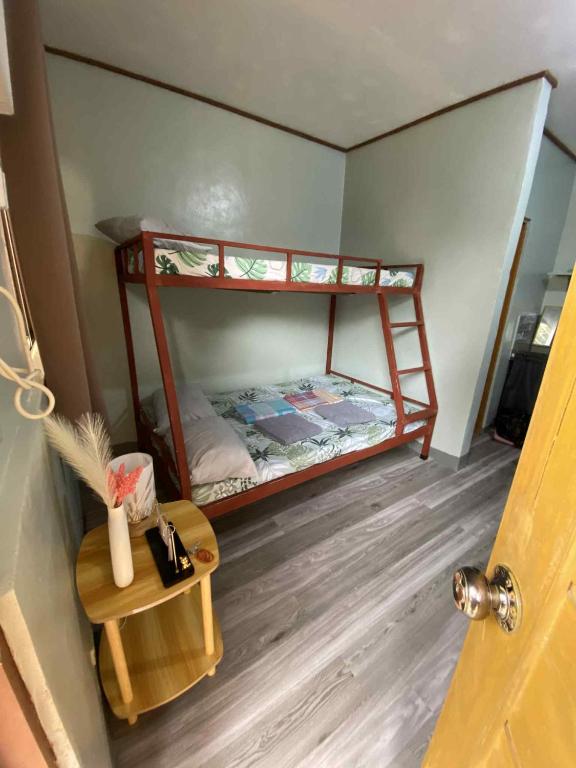 Postel nebo postele na pokoji v ubytování Frogman inn