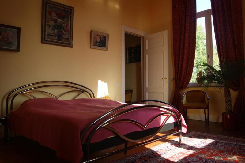 Postel nebo postele na pokoji v ubytování Chateau Neufays