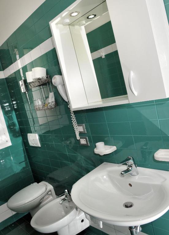 Koupelna v ubytování Hotel Raffaello