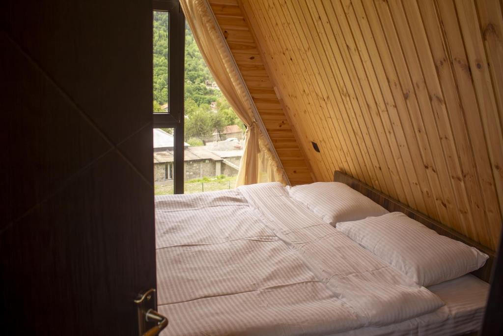 Postel nebo postele na pokoji v ubytování A-frame Wonder