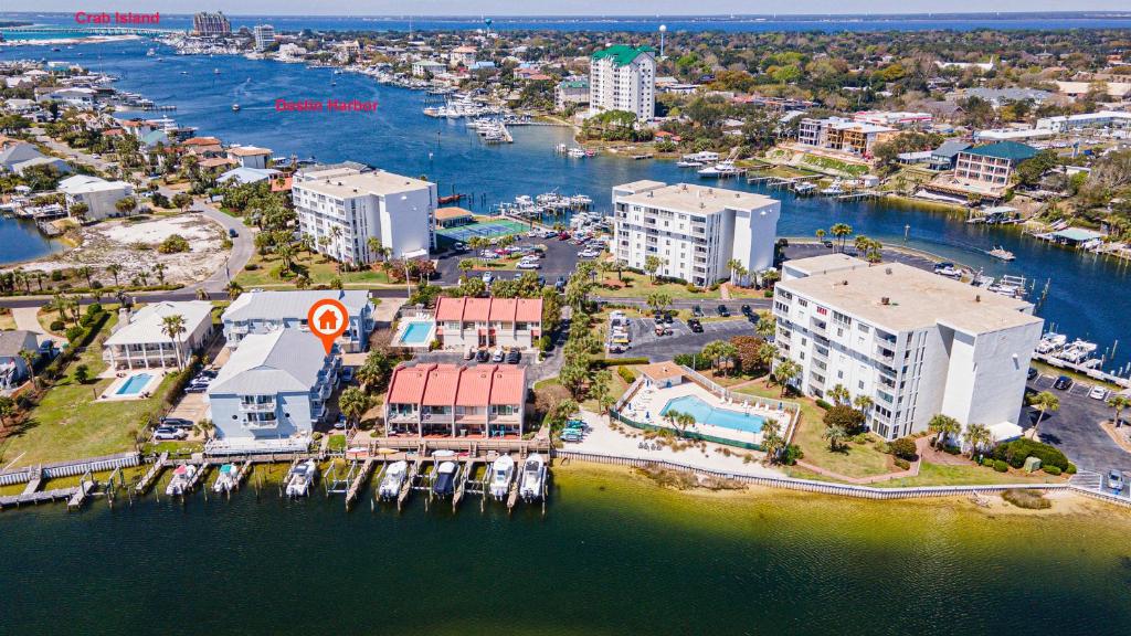 an aerial view of a city with a harbor at Long Island at Laguna Point in Destin