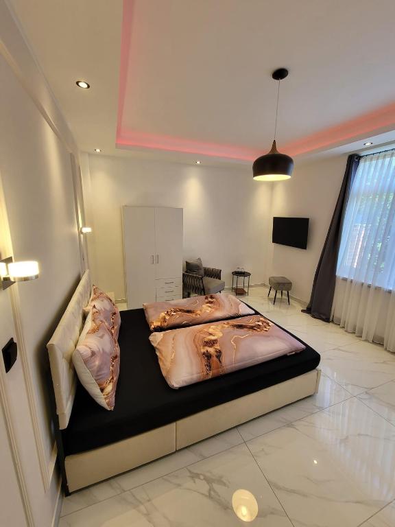 Postel nebo postele na pokoji v ubytování Haus Deitje