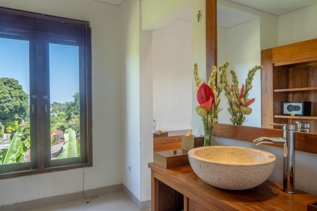 Kuchyň nebo kuchyňský kout v ubytování Mahadana Ubud