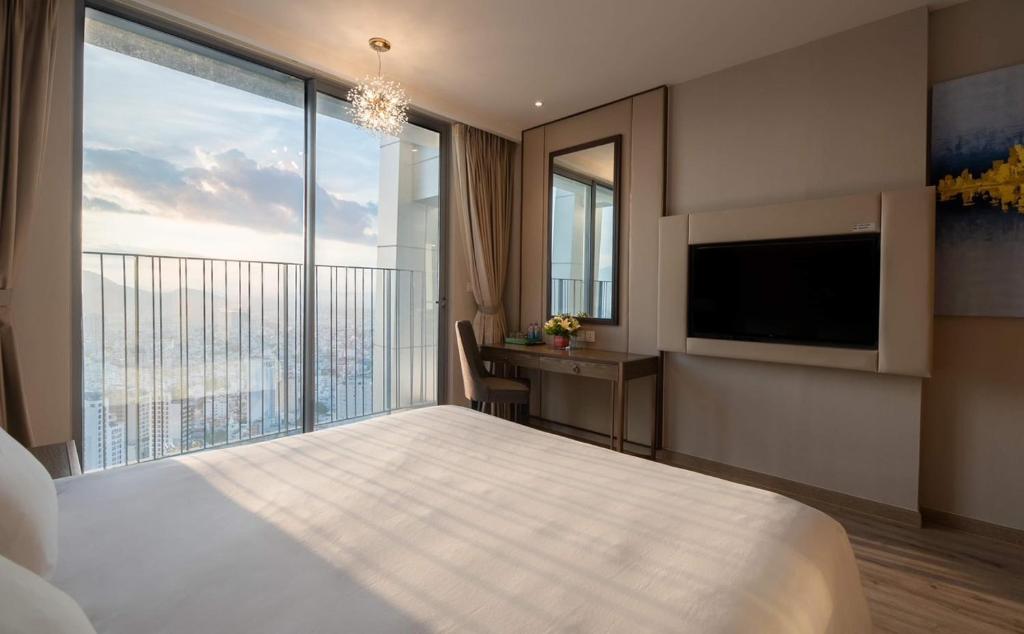 Giường trong phòng chung tại Panorama Apartment NHA TRANG
