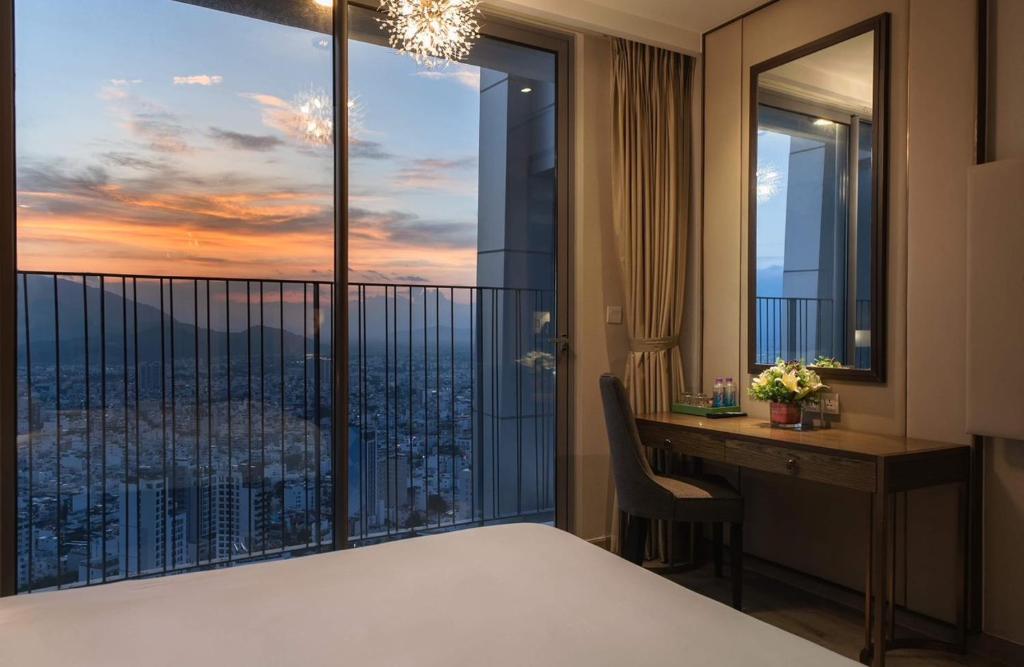 Giường trong phòng chung tại Panorama Apartment NHA TRANG