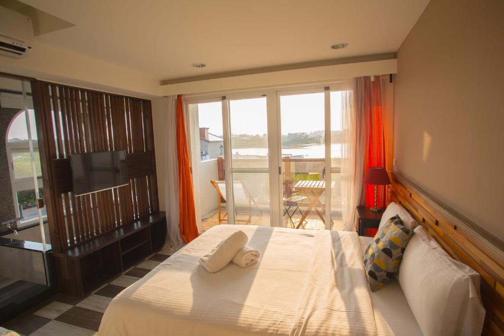 Postel nebo postele na pokoji v ubytování Malibu OceanView Homestay