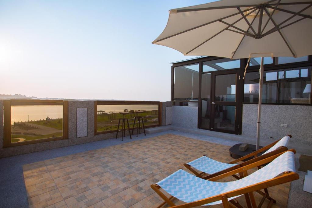 Balkón nebo terasa v ubytování Malibu OceanView Homestay