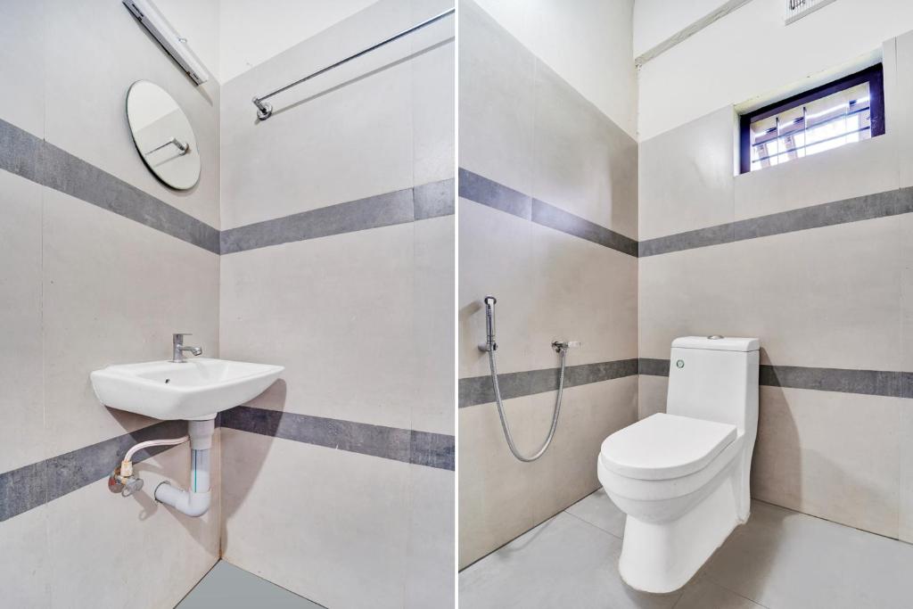 Koupelna v ubytování Super Hotel O Ambalamedu