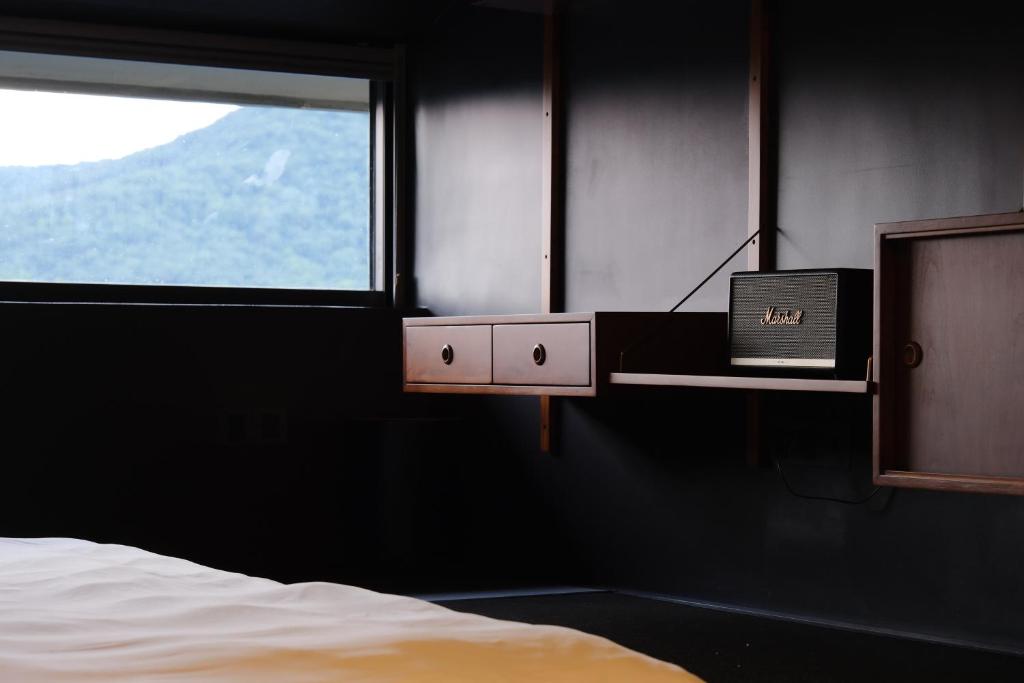 Postel nebo postele na pokoji v ubytování Hangzhou KeYe Homestay