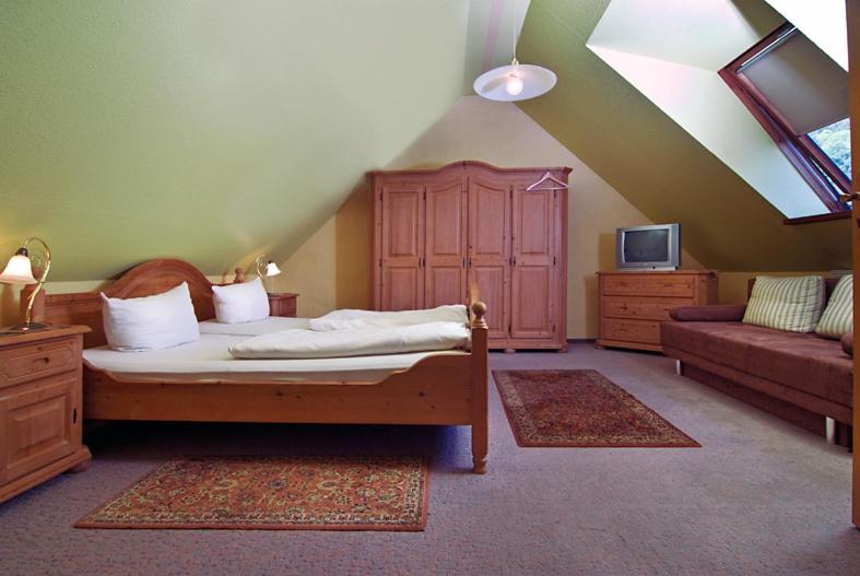 Postel nebo postele na pokoji v ubytování Hotel Kugel