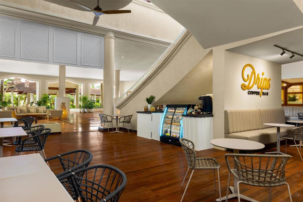 Restoran või mõni muu söögikoht majutusasutuses Wyndham Alltra Punta Cana All Inclusive Resort