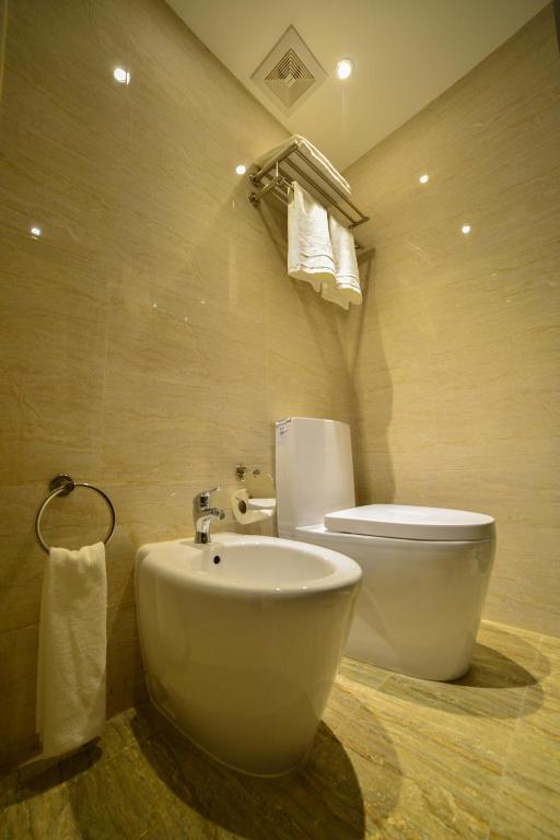 Koupelna v ubytování P Quattro Relax Hotel