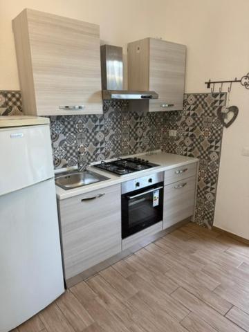 Kuchyň nebo kuchyňský kout v ubytování Fantasy House Ischia