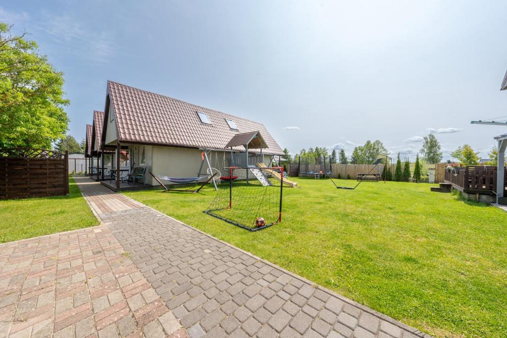 Vonkajšia záhrada v ubytovaní Domki letniskowe i pokoje u Katarzyny