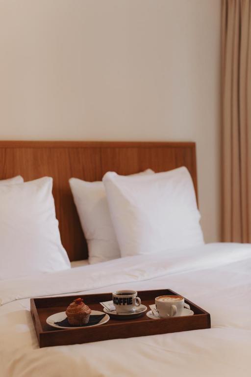 Postel nebo postele na pokoji v ubytování Man Met Bril Koffie Hotel