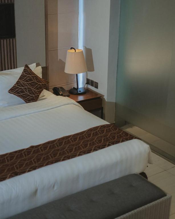 Postel nebo postele na pokoji v ubytování De Atlantiis Suites Near IGI Airport