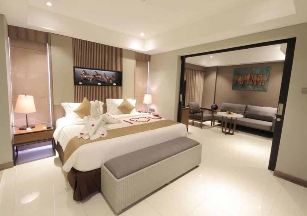 Postel nebo postele na pokoji v ubytování De Atlantiis Suites Near IGI Airport