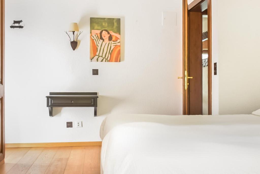 Postel nebo postele na pokoji v ubytování Between Boutique Hotel
