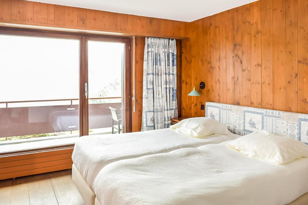 Postel nebo postele na pokoji v ubytování Between Boutique Hotel