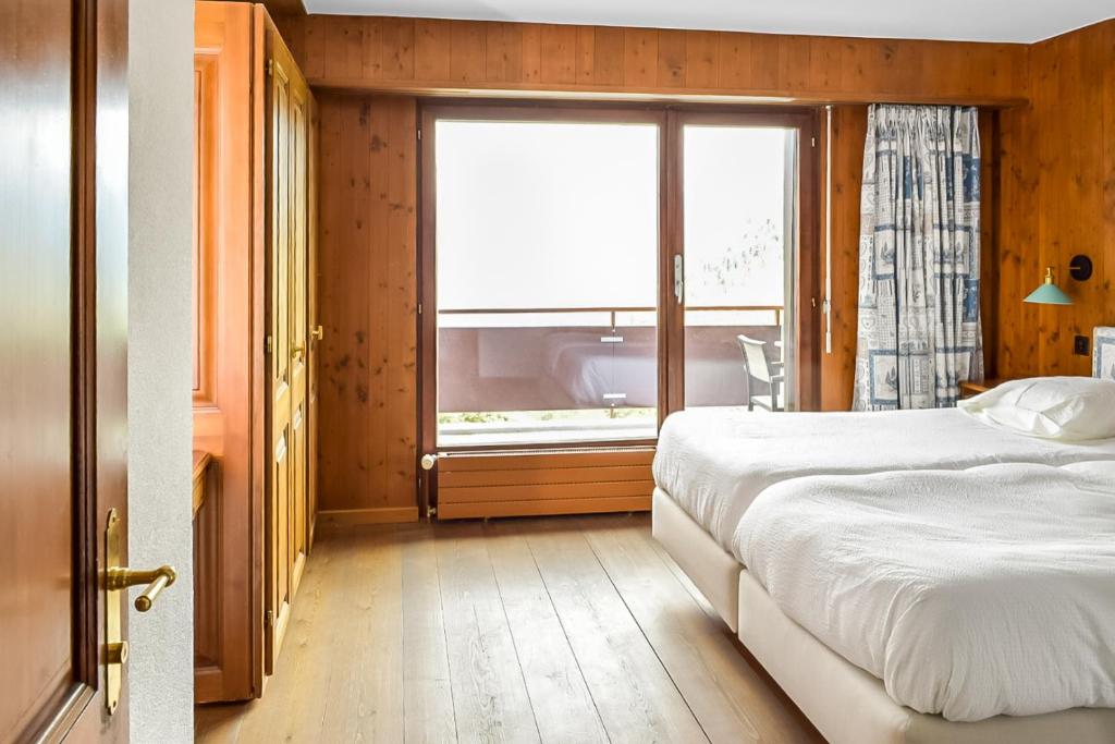 Postel nebo postele na pokoji v ubytování Between Boutique Hotel
