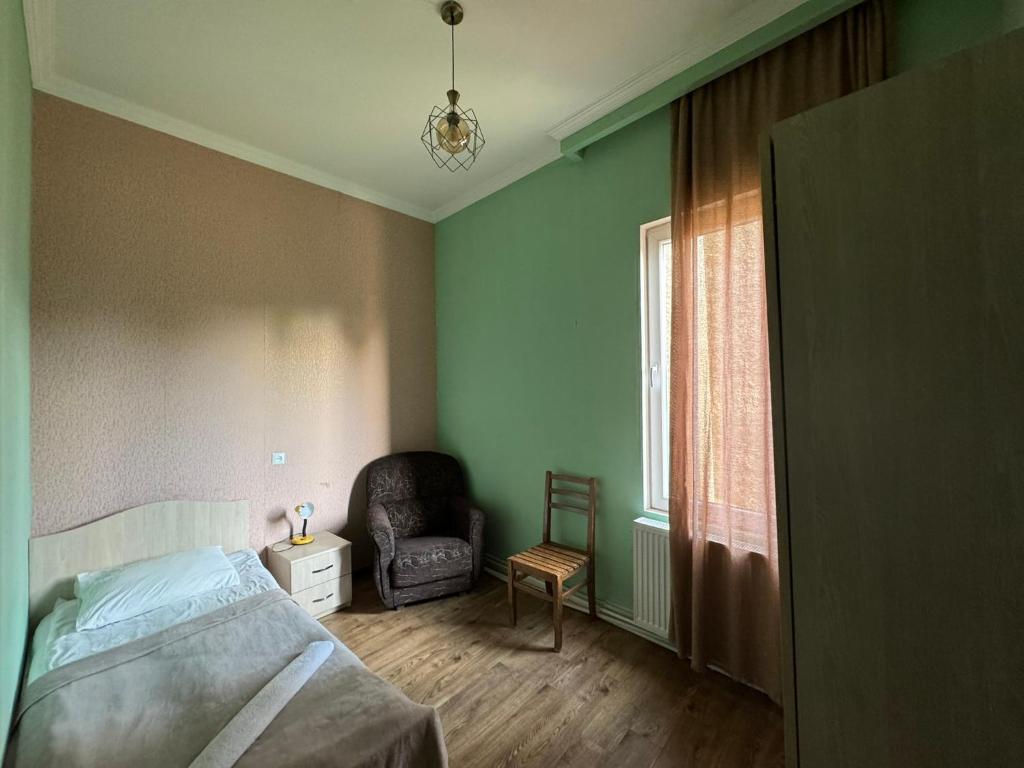 Postel nebo postele na pokoji v ubytování Guest House Sanapiro