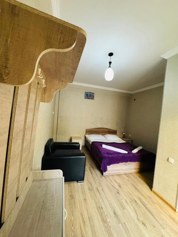 Postel nebo postele na pokoji v ubytování Guest House Sanapiro