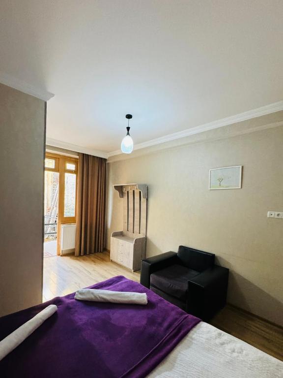 Postel nebo postele na pokoji v ubytování Guest House Sanapiro