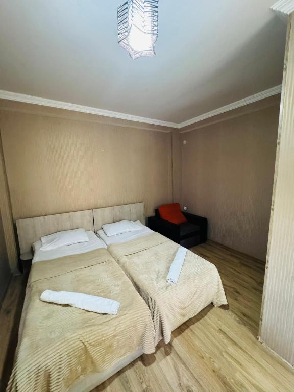Postel nebo postele na pokoji v ubytování Guest House Sanapiro