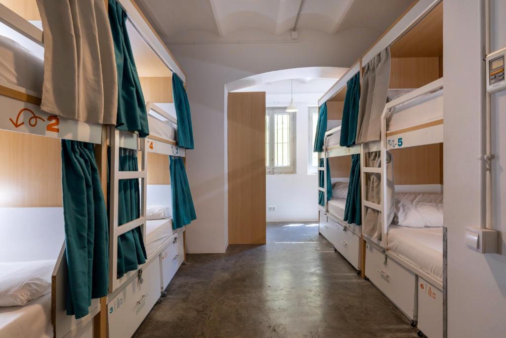 Cama ou camas em um quarto em The Loft House Barcelona