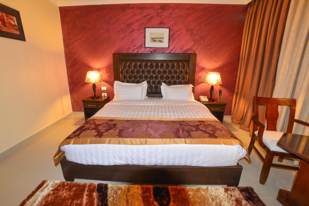 Postel nebo postele na pokoji v ubytování P Quattro Relax Hotel