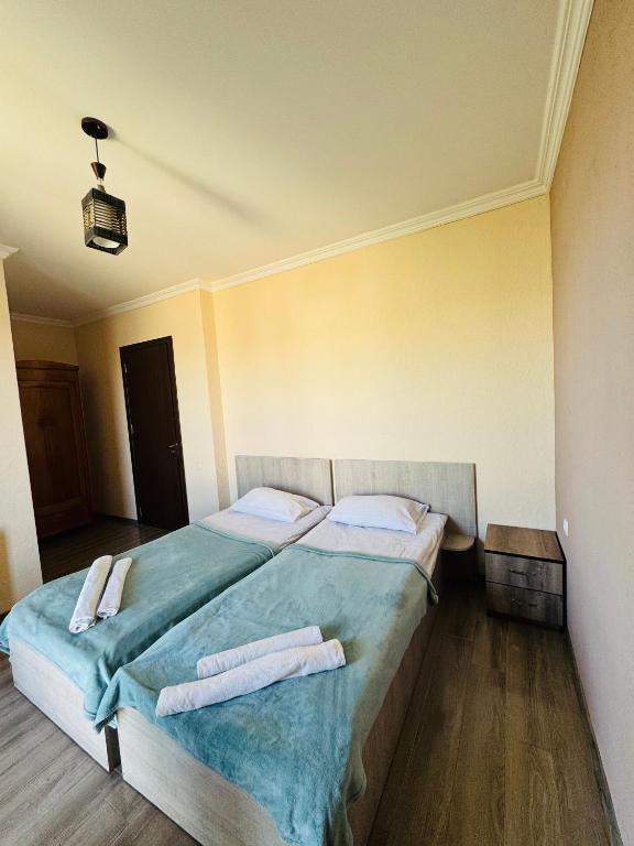 Postel nebo postele na pokoji v ubytování Guest House Sanapiro