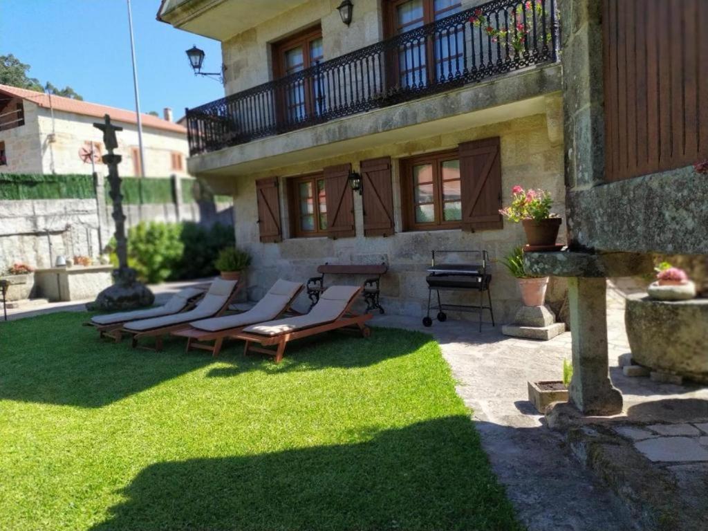 Vonkajšia záhrada v ubytovaní O Apartamento do Xanza, ideal para parejas ADAPTADO MOVILIDAD REDUCIDA