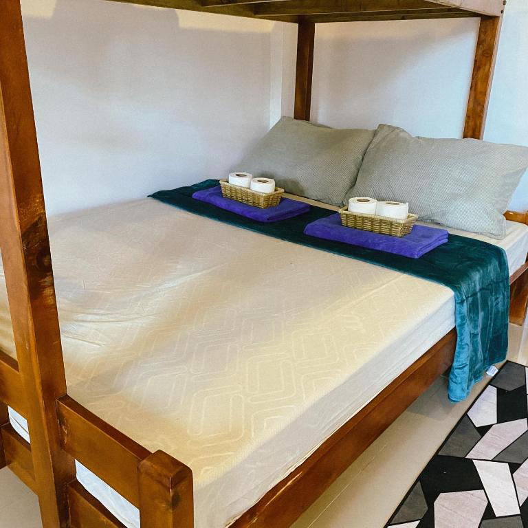 Postel nebo postele na pokoji v ubytování Hapitanan Hostel Siargao