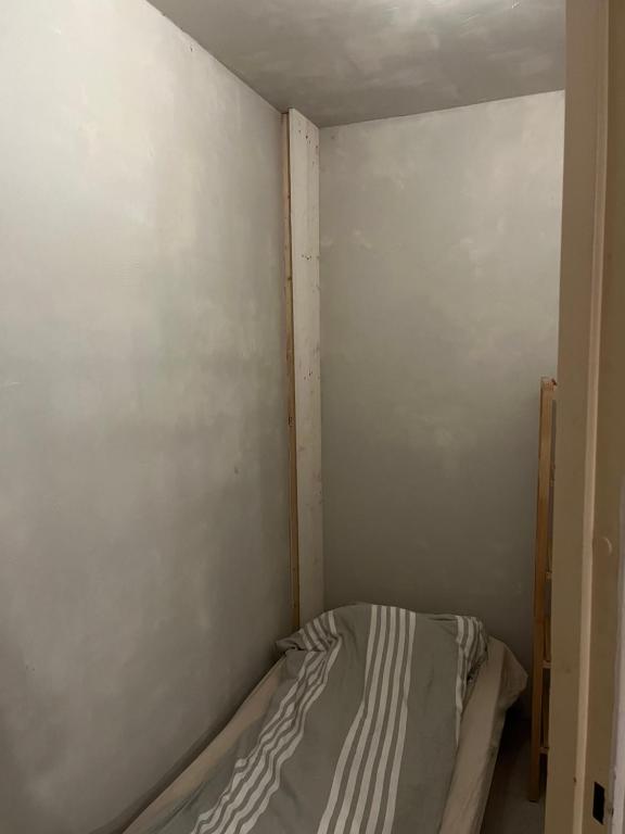 Postel nebo postele na pokoji v ubytování privateroominasharedaccomadation1
