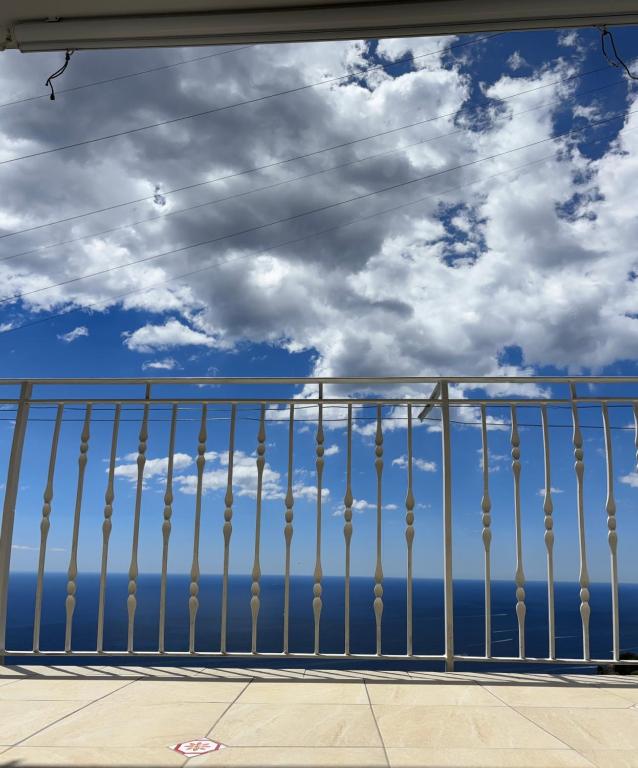 a view of the ocean from a balcony at Luisa apartments, Coastal escape on the Amalfi Coast! in Furore