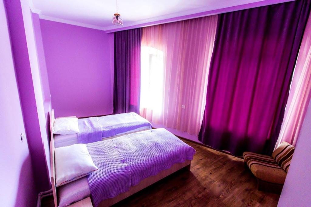 Postel nebo postele na pokoji v ubytování Guest House Sanapiro