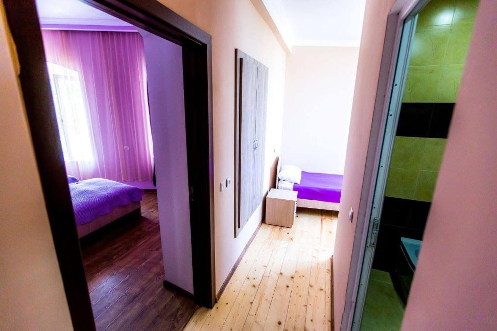 Postel nebo postele na pokoji v ubytování Guest House Sanapiro