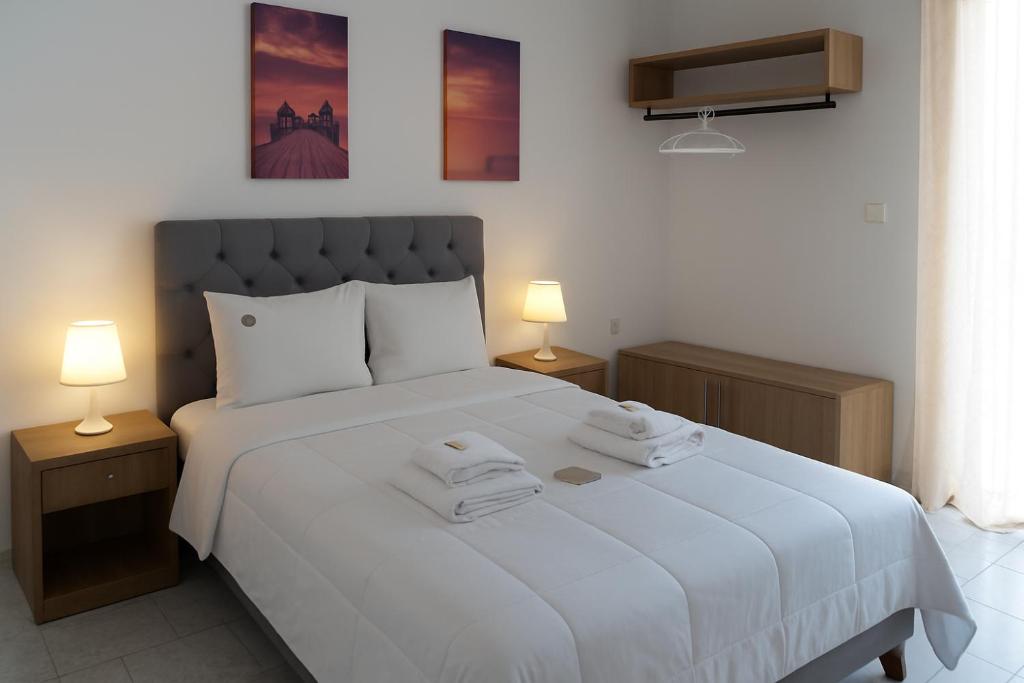 Postel nebo postele na pokoji v ubytování Mak Luxury Rooms