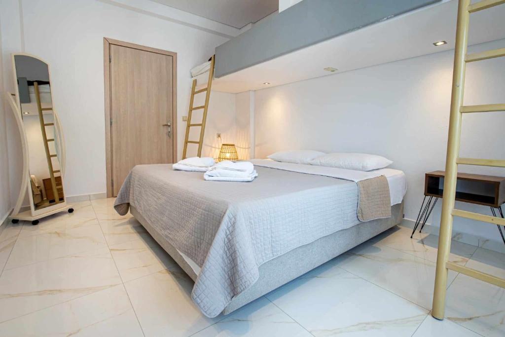 Postel nebo postele na pokoji v ubytování MaK Apartments