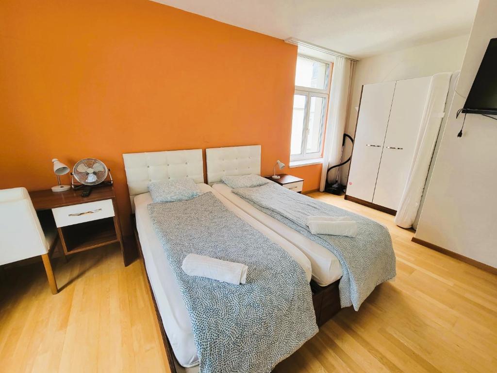 Postel nebo postele na pokoji v ubytování Renovated Apartment Near Zurich Lake Sees - Self Checkin