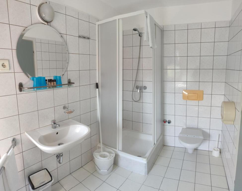 Koupelna v ubytování Abbázia Club Hotel Kék