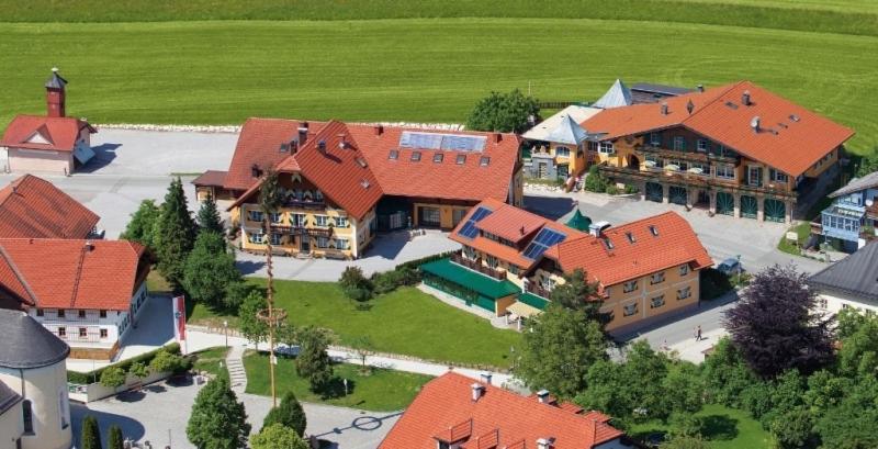 an overhead view of a large building with red roofs at Hotel Kirchbichl in Hallwang