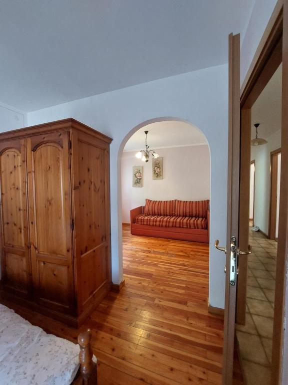 Łóżko lub łóżka w pokoju w obiekcie Agritur Broch