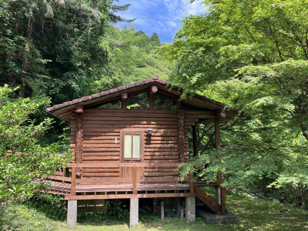a cabin in the middle of a forest at Nature Resort in Shimanto / Vacation STAY 33183 in Funato