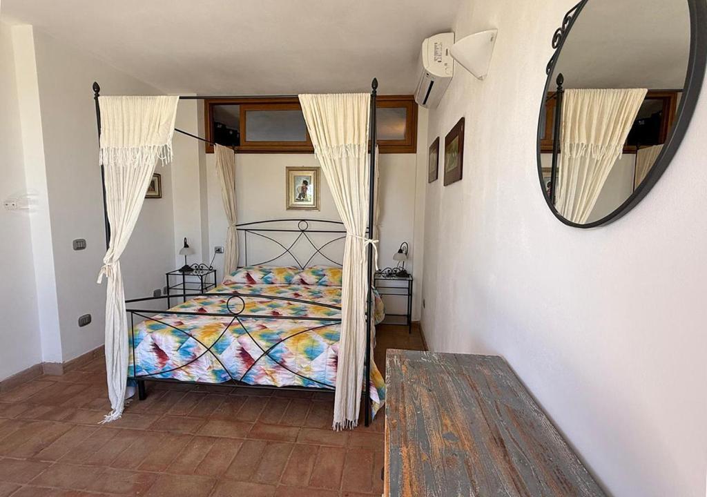 A bed or beds in a room at Casa Katia, Giuliana & Nami